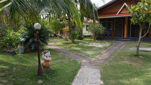 Jardín al aire libre en First Villa Beach Resort