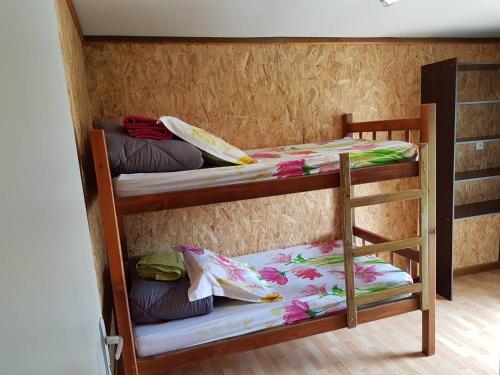 Postel nebo postele na pokoji v ubytování Ti Kaz Lontan