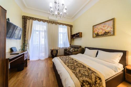 Vuode tai vuoteita majoituspaikassa Kiev Centre Apartments