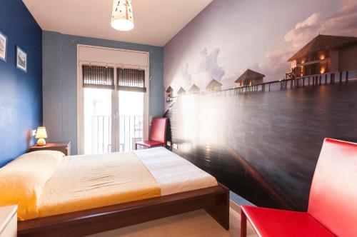 Posteľ alebo postele v izbe v ubytovaní Lets Holidays Sant Sebastià apartment