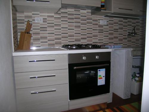 Kuchyň nebo kuchyňský kout v ubytování Chalet Grazia