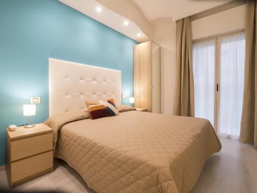 מיטה או מיטות בחדר ב-Hotel Levante