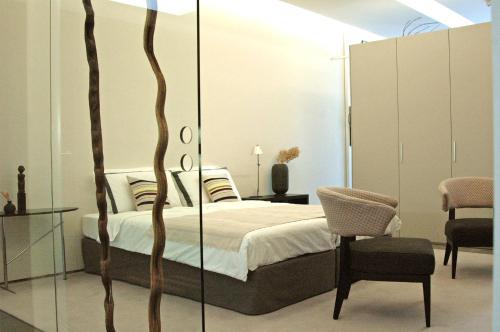 Un pat sau paturi într-o cameră la Maison Wyck