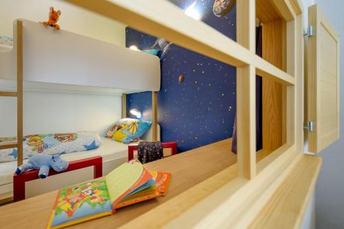Кровать или кровати в номере ibis Styles Leipzig