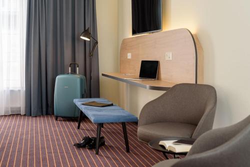 Телевизор и/или развлекательный центр в ibis Styles Leipzig