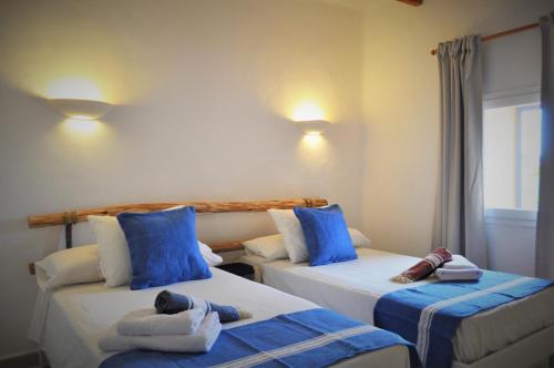 A bed or beds in a room at Siamoformentera Alessandra