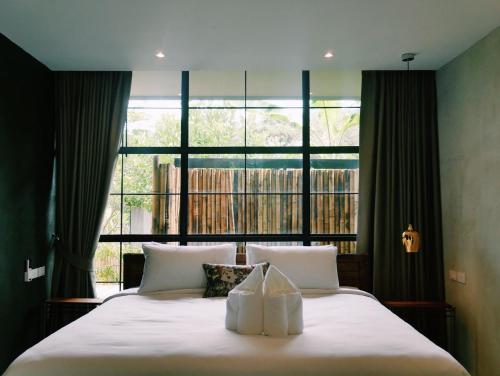 Ένα ή περισσότερα κρεβάτια σε δωμάτιο στο Gajib Bed&Breakfast