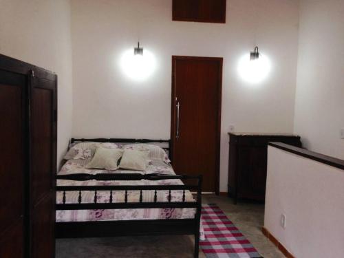 Cama o camas de una habitación en Loft da Serra