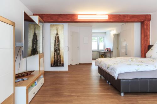 Ένα ή περισσότερα κρεβάτια σε δωμάτιο στο Haus Pia Executive Apartments