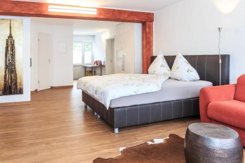 Ένα ή περισσότερα κρεβάτια σε δωμάτιο στο Haus Pia Executive Apartments