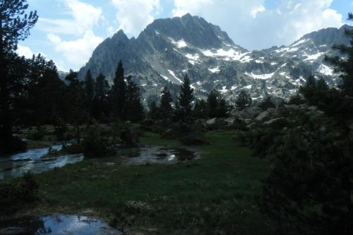 a view of a mountain with a river and trees at Amaroq Explorers BaseCamp in Tremp