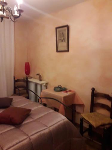 Ένα ή περισσότερα κρεβάτια σε δωμάτιο στο Chambre chez l’habitant chez Nadine