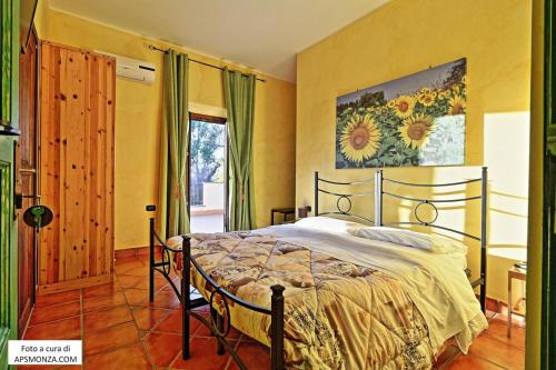 Tempat tidur dalam kamar di Casale Del Vento