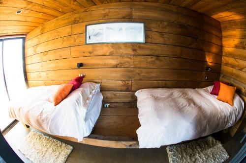 Tempat tidur dalam kamar di Cabañas Mirador de Matanzas