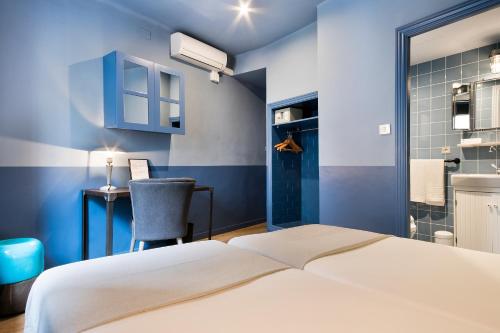 Cama o camas de una habitación en Hotel El Call