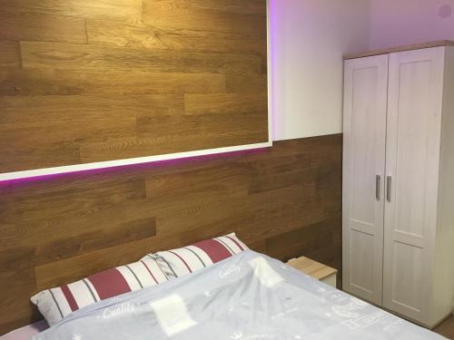 Postel nebo postele na pokoji v ubytování ACO Apartment