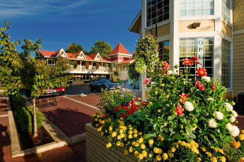 a group of flowers in front of a building at Silverton Inn & Suites in Silverton