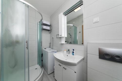 Koupelna v ubytování Apartments Miramar
