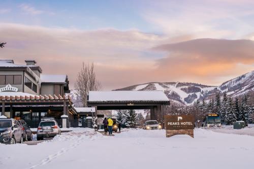 a ski resort in the mountains with snow on the ground at Park City Peaks in Park City