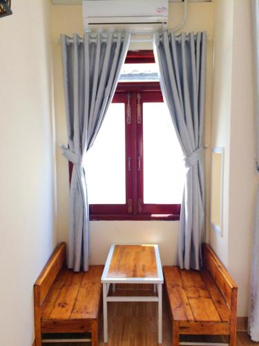 Posezení v ubytování Bot Bien Homestay