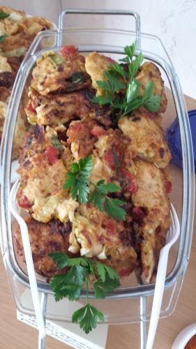 a glass dish of food with parsley on top of it at POKOJE GOŚCINNE RENATA KNITTER in Komnino