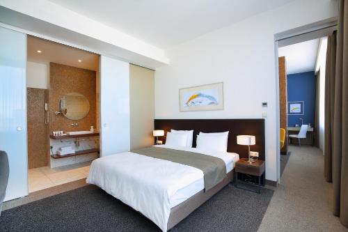 Кровать или кровати в номере Отель Victor
