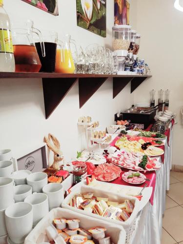 a buffet line with many different types of food at Willa Adonis in Świnoujście