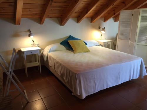 En eller flere senge i et værelse på Mares - Atic