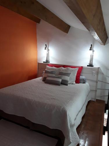 Postel nebo postele na pokoji v ubytování Le Mouleyras