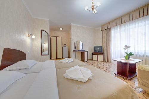 Tempat tidur dalam kamar di Milotel Pavel
