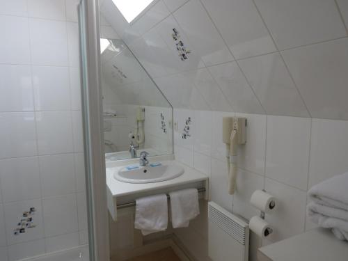 Koupelna v ubytování Hotel Côte d'Opale