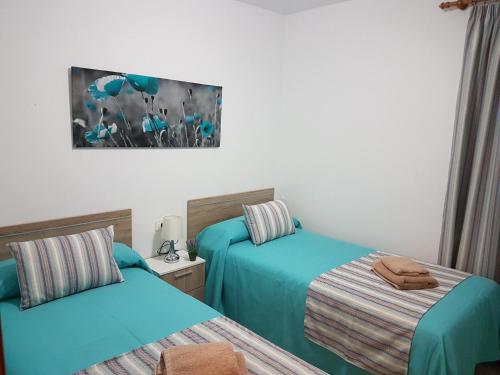 Postel nebo postele na pokoji v ubytování Villa Samba