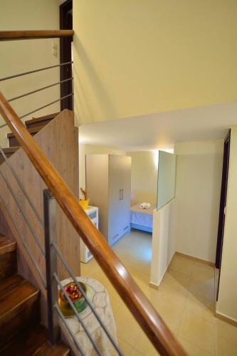 a hallway with a staircase in a house at Balcony Rooms in Elafonisi
