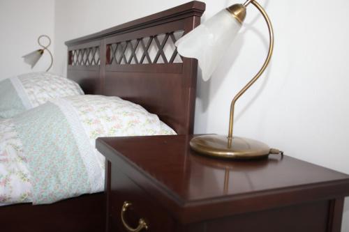 מיטה או מיטות בחדר ב-Apartament Rodzinny S10