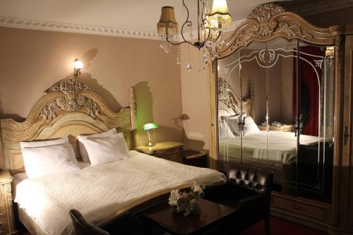 Postel nebo postele na pokoji v ubytování Hotel Adria