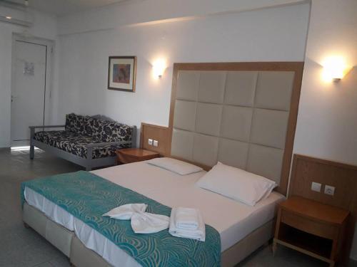 Katil atau katil-katil dalam bilik di Haridimos Apartments