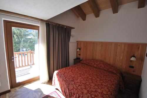 Postel nebo postele na pokoji v ubytování Hotel Bellevue