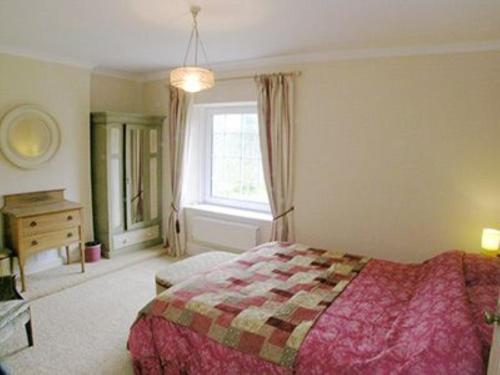 A bed or beds in a room at Forest View 