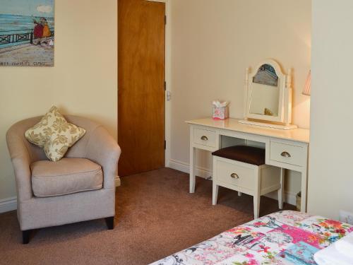 A seating area at Queensbury Cottage 