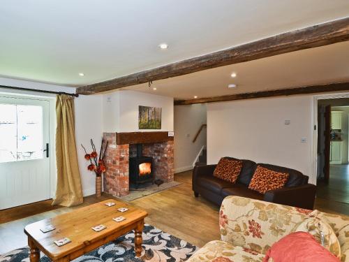 A seating area at Honeystring Cottage 