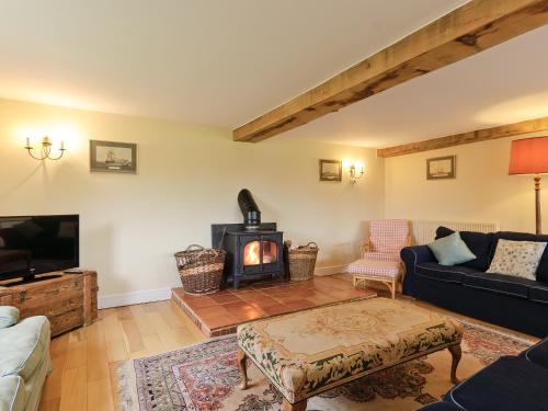 A seating area at The Stables At Southfield House 