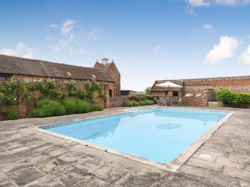 The swimming pool at or near The Stables At Southfield House 