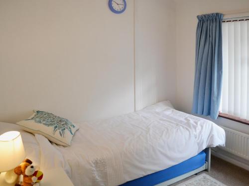 A bed or beds in a room at Sundorne 