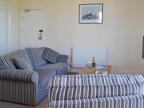 A seating area at Claremont House - Suite 1 