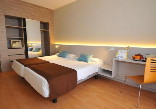 Postel nebo postele na pokoji v ubytování Paradise Park Fun Lifestyle Hotel
