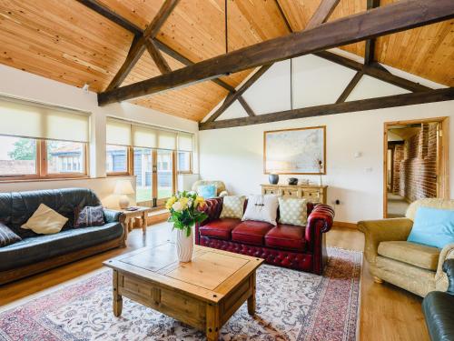 A seating area at Monks Barn 