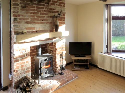 A television and/or entertainment center at Two Burtons Farm 