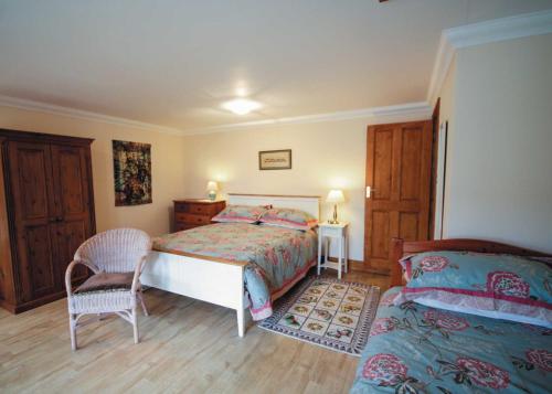 A bed or beds in a room at The Goat House 