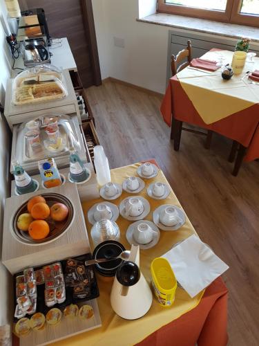 a table with food on it in a kitchen at San Pietro in Mileto