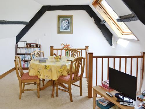 A restaurant or other place to eat at Rosie'S Barn 